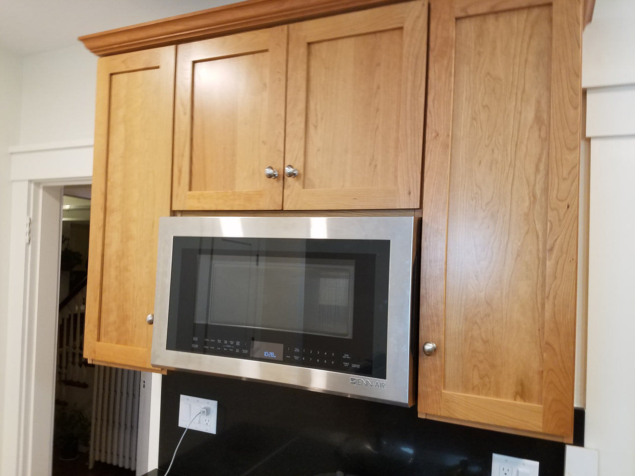 Custom Kitchen Cabinets with Black Quartz Countertops