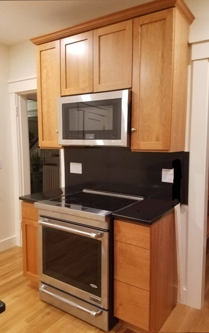 Custom Kitchen Cabinets with Black Quartz Countertops